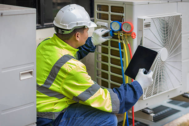 Professional Air Duct Cleaning technician working in Ridgefield, NJ